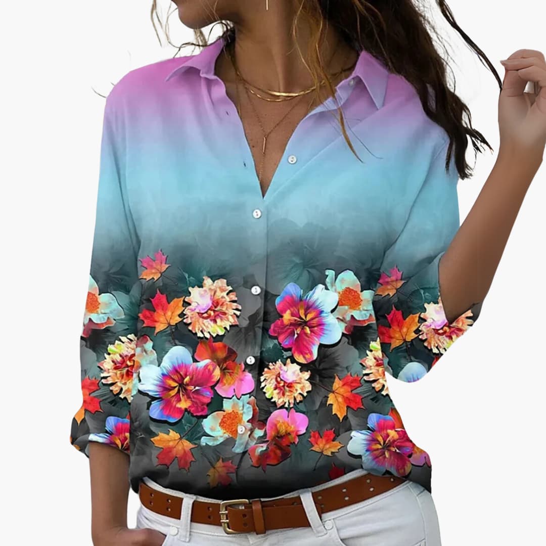 Flora Women’s Blouse featuring a vibrant colorblock floral design and a flattering cut, perfect for stylish casual wear. 5