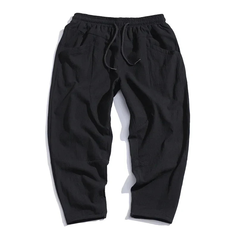 Grove Men’s Cropped Pants featuring an adjustable drawstring waist and articulated paneling for enhanced comfort and style. 4
