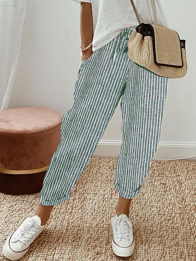 Helga Women's Trousers featuring a flattering fit and breathable design, perfect for comfort and style in any casual or professional setting. 9