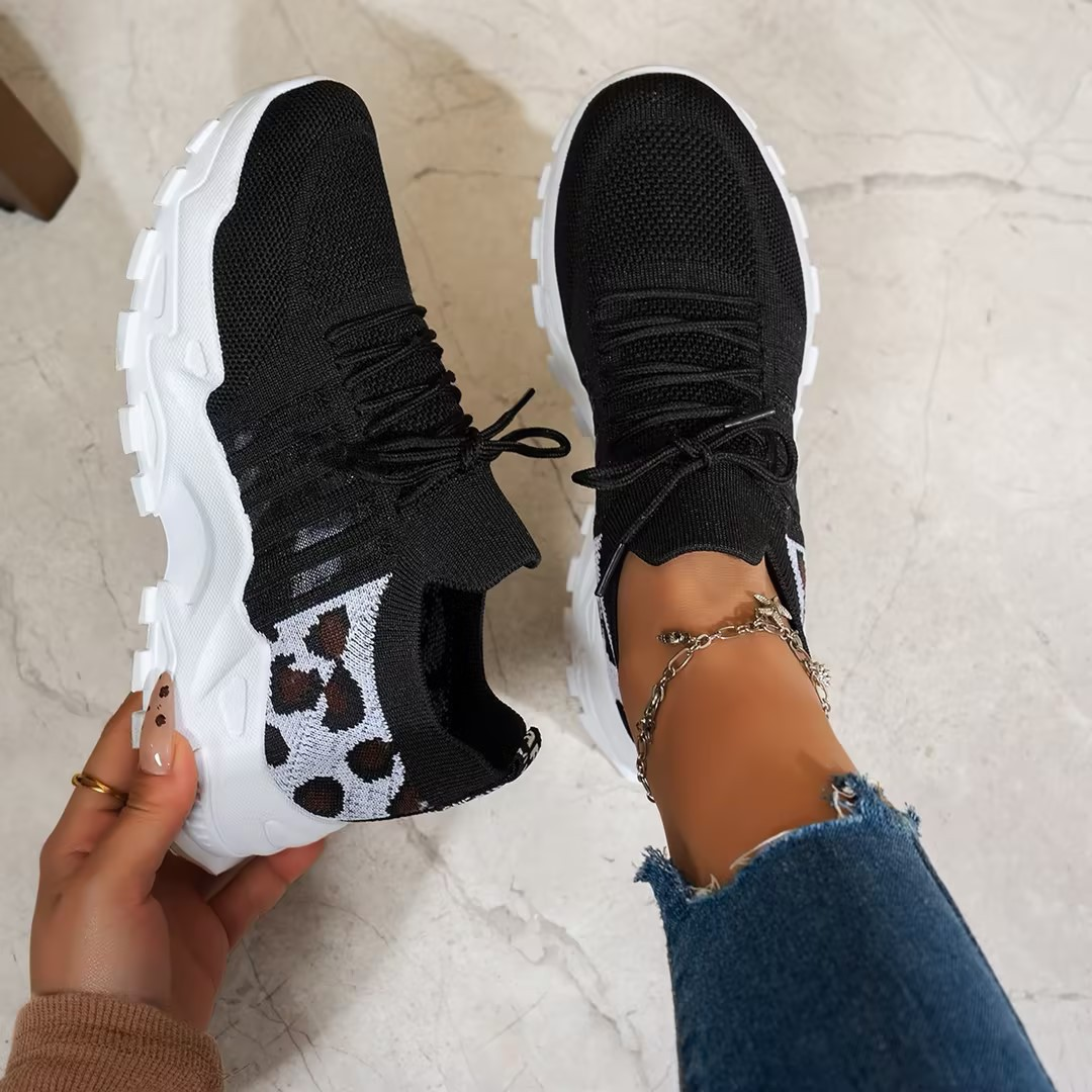 Mica Women’s Sneakers featuring a wide toe box and arch support for enhanced comfort and style. 9