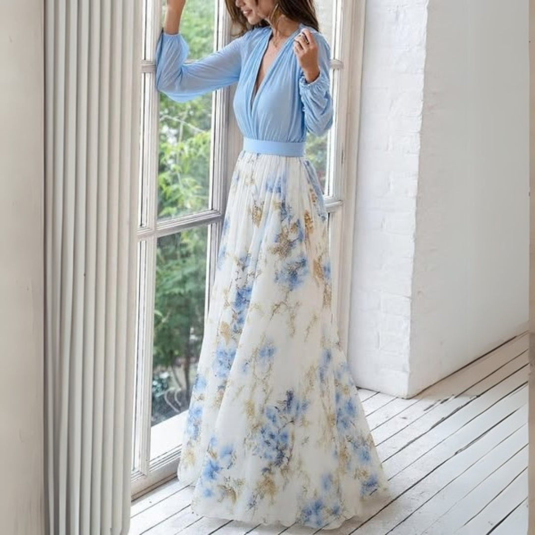 Rita Women’s Maxi Dress featuring a vibrant floral print and a flowing design, perfect for summer outings and special occasions. 2