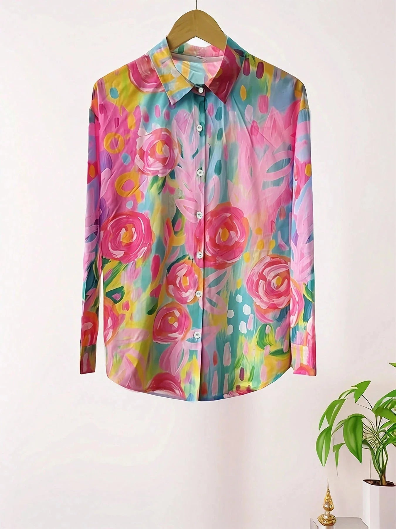 Tara Women’s Blouse featuring a vibrant colorful print and lightweight airy fit, perfect for stylish summer wear. 6