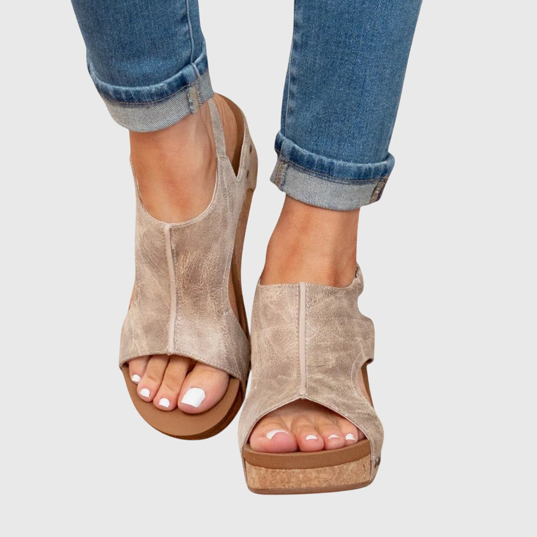 Adela Women’s Sandals featuring an adjustable buckle and a lightweight wedge design, perfect for comfort and style. 0