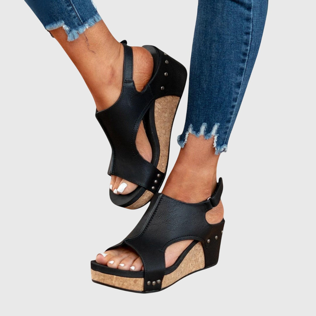 Adela Women’s Sandals featuring an adjustable buckle and a lightweight wedge design, perfect for comfort and style. 6