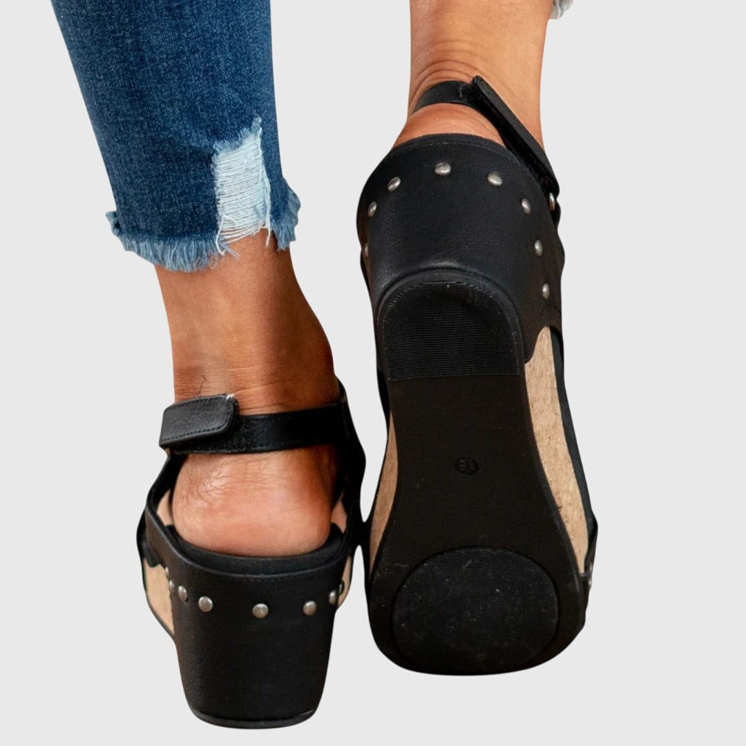 Adela Women’s Sandals featuring an adjustable buckle and a lightweight wedge design, perfect for comfort and style. 7