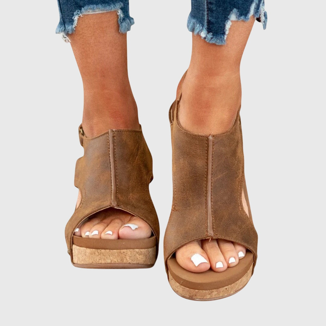 Adela Women’s Sandals featuring an adjustable buckle and a lightweight wedge design, perfect for comfort and style. 8