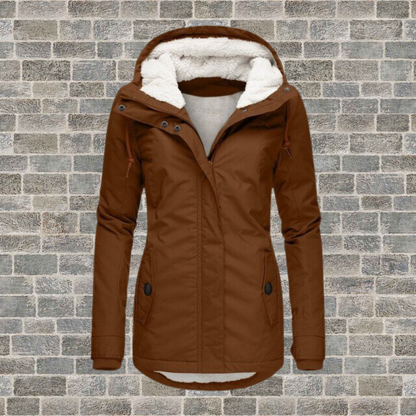 Adelaide Women’s Coat featuring a hood and stylish pleated detailing, perfect for chic and cozy winter looks. 2