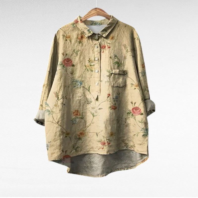 Adira Women’s Blouse featuring a vibrant floral pattern and convenient pocket detail, perfect for casual or semi-formal occasions. 3