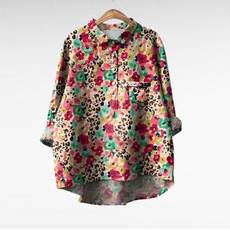 Adira Women’s Blouse featuring a vibrant floral pattern and convenient pocket detail, perfect for casual or semi-formal occasions. 4