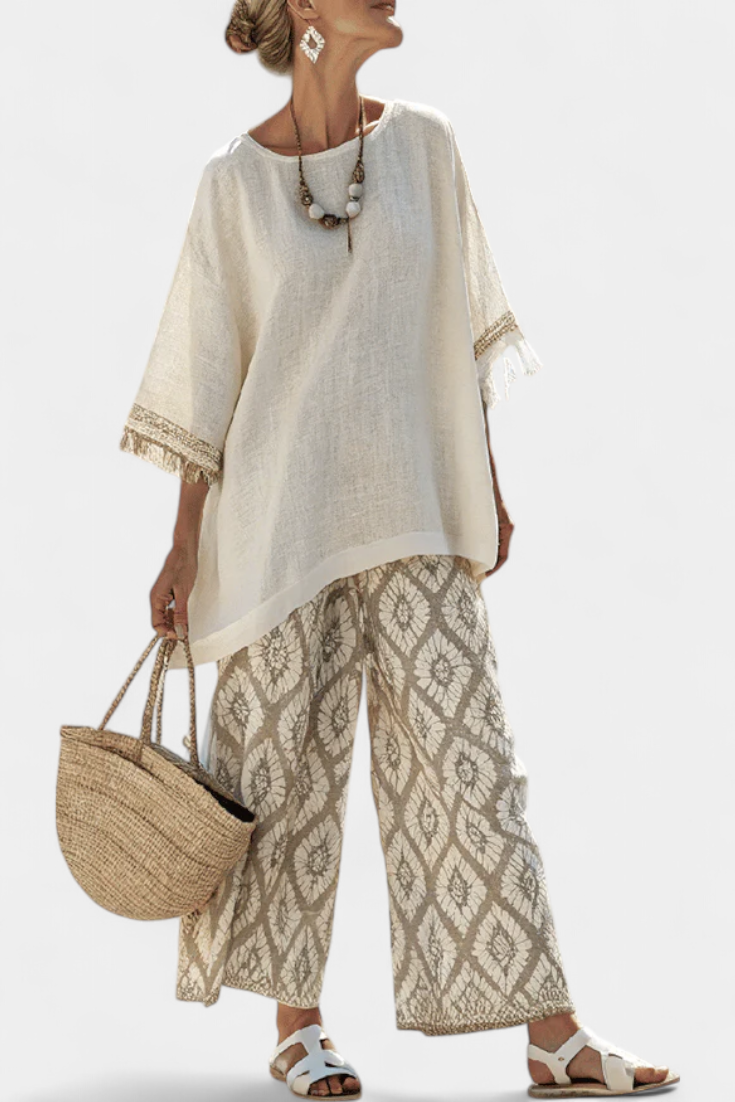 Alverra Women’s Outfit featuring stylish fringe accents and ethnic print trousers, perfect for a trendy and bohemian look. 0