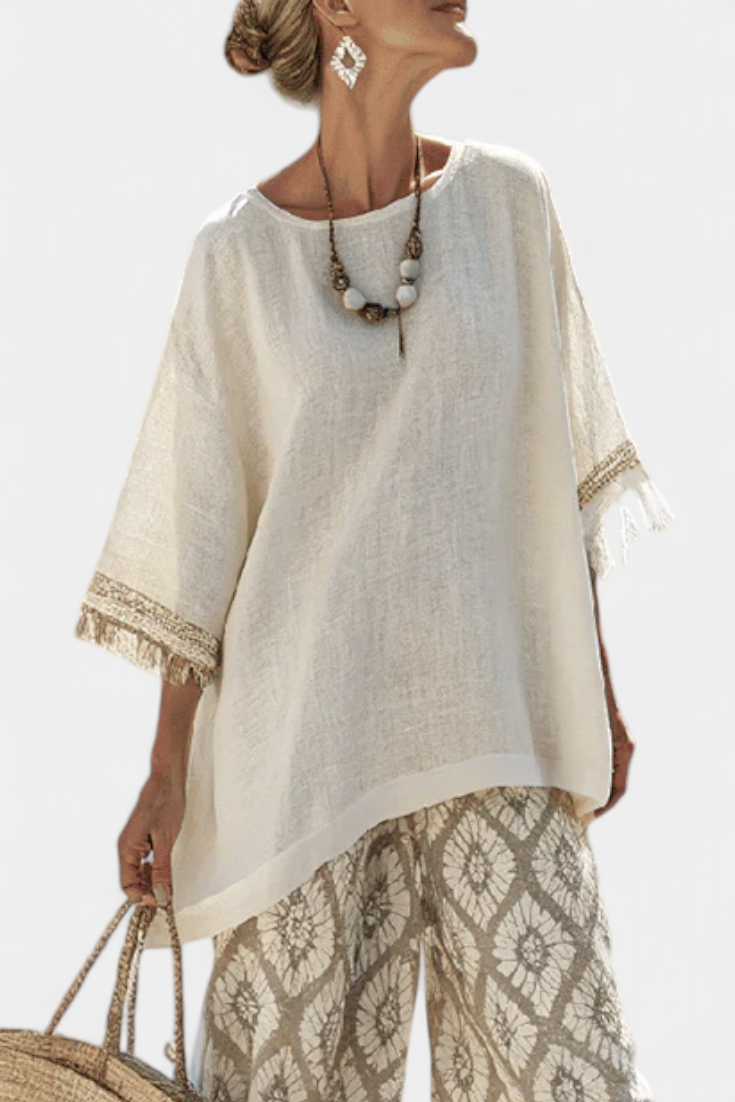 Alverra Women’s Outfit featuring stylish fringe accents and ethnic print trousers, perfect for a trendy and bohemian look. 1