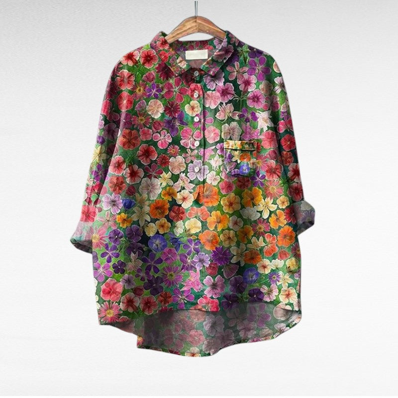 Amaya Women’s Floral Blouse featuring a vibrant multicolour pattern and a relaxed fit, perfect for casual wear and spring fashion. 1