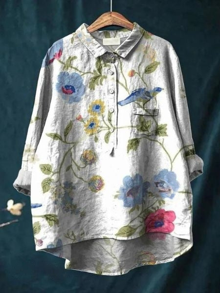 Aura Women's Blouse featuring a stylish abstract floral print and a button front design, perfect for casual or semi-formal occasions. 10
