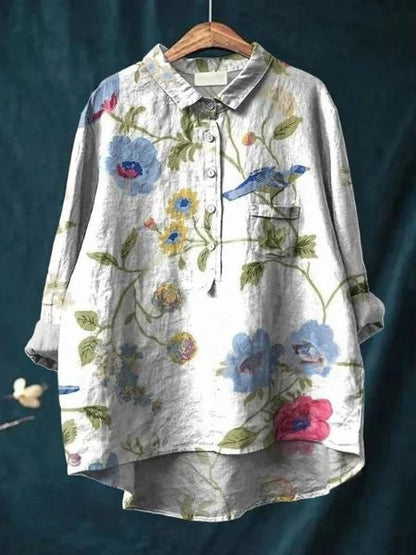 Aura Women's Blouse featuring a stylish abstract floral print and a button front design, perfect for casual or semi-formal occasions. 10