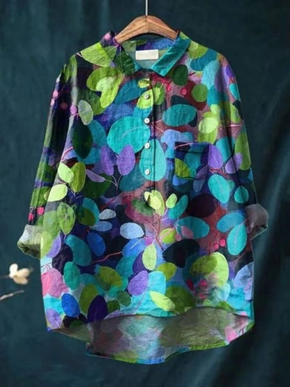 Aura Women's Blouse featuring a stylish abstract floral print and a button front design, perfect for casual or semi-formal occasions. 13