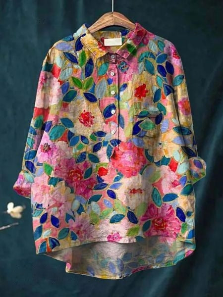 Aura Women's Blouse featuring a stylish abstract floral print and a button front design, perfect for casual or semi-formal occasions. 2