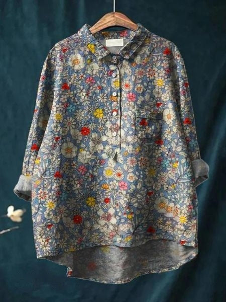 Aura Women's Blouse featuring a stylish abstract floral print and a button front design, perfect for casual or semi-formal occasions. 3
