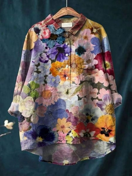Aura Women's Blouse featuring a stylish abstract floral print and a button front design, perfect for casual or semi-formal occasions. 8
