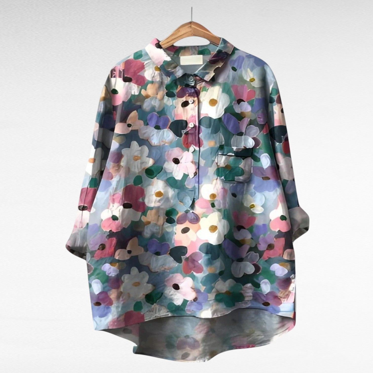 Aurelie women's blouse featuring a classic collar and a vibrant floral print, perfect for casual or formal occasions. 0