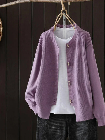 Auri Women’s Cardigan featuring elegant pearl-inspired buttons and a relaxed fit, perfect for stylish layering in any season. 3