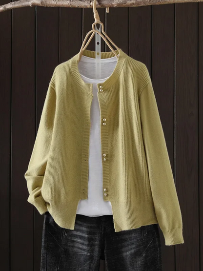 Auri Women’s Cardigan featuring elegant pearl-inspired buttons and a relaxed fit, perfect for stylish layering in any season. 5