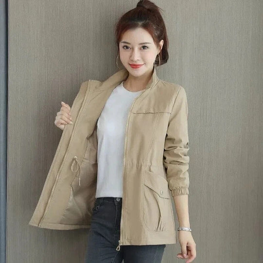 Aurora Women's Casual Jacket featuring a lightweight design and adjustable drawstring waist for a stylish and comfortable fit. 1