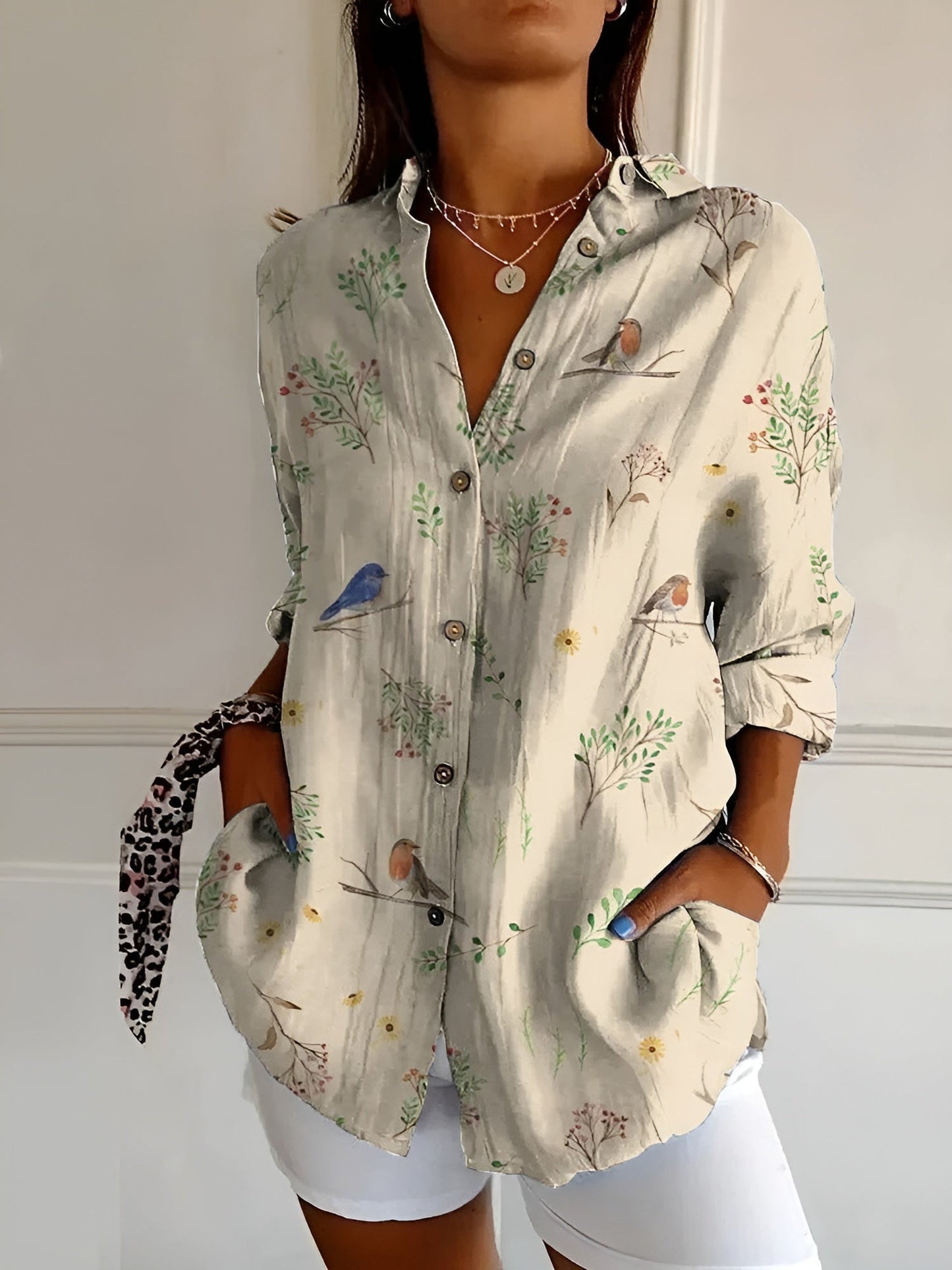 Ava Women's Blouse featuring whimsical prints and a comfortable fit, perfect for casual and semi-formal occasions. 3