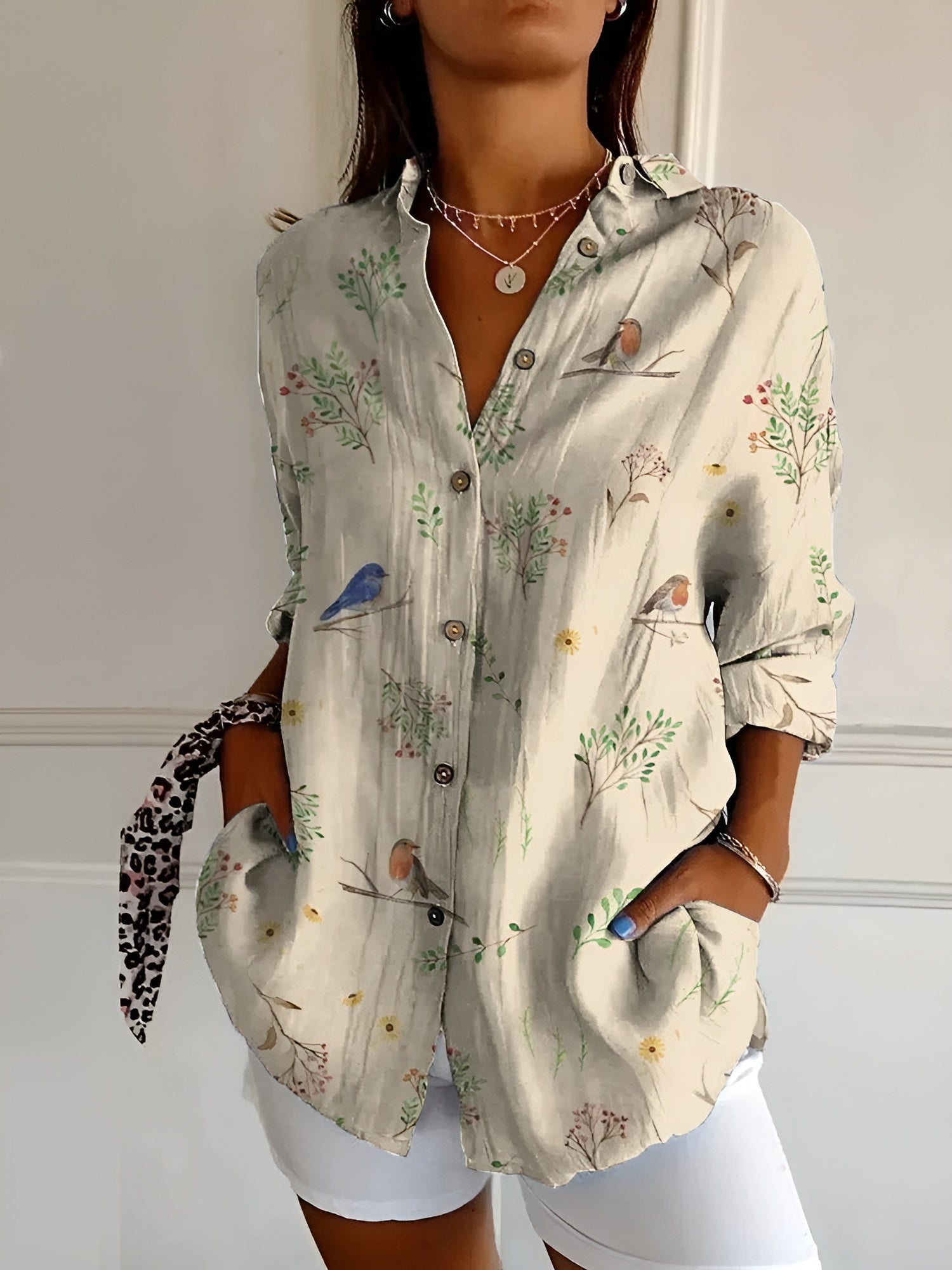 Ava Women's Blouse featuring whimsical prints and a comfortable fit, perfect for casual and semi-formal occasions. 3