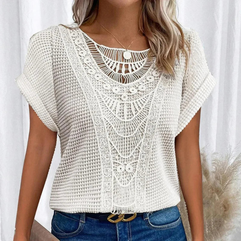Bella Women’s Blouse featuring a decorative crochet neckline and short sleeves, perfect for casual and formal occasions. 10