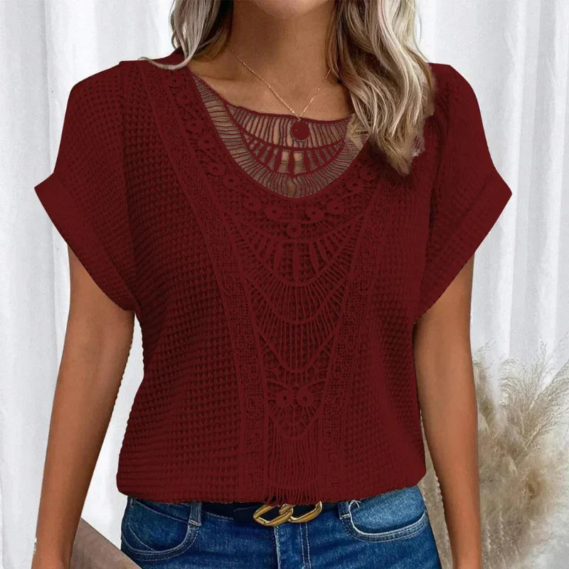 Bella Women’s Blouse featuring a decorative crochet neckline and short sleeves, perfect for casual and formal occasions. 9