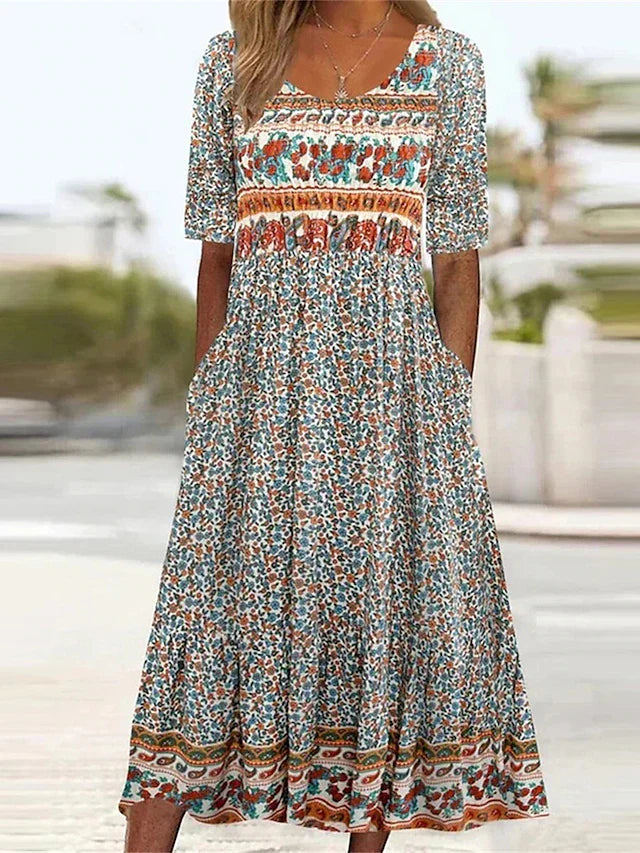Bella Women’s Dress featuring a vibrant Bohemian print and stylish short sleeves, perfect for summer outings and casual events. 0