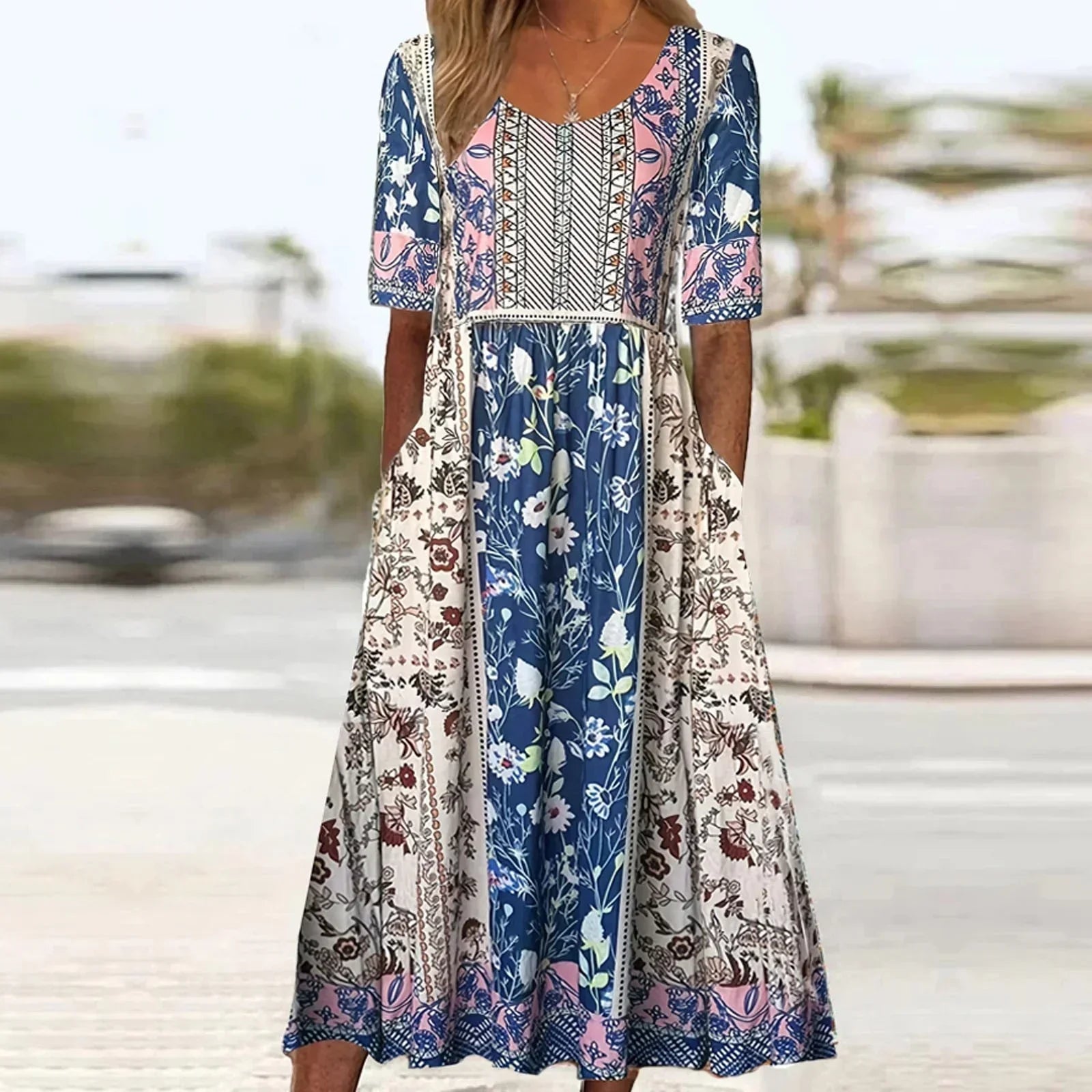 Bella Women’s Dress featuring a vibrant Bohemian print and stylish short sleeves, perfect for summer outings and casual events. 2