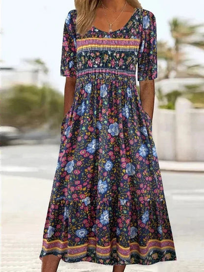 Bella Women’s Dress featuring a vibrant Bohemian print and stylish short sleeves, perfect for summer outings and casual events. 4