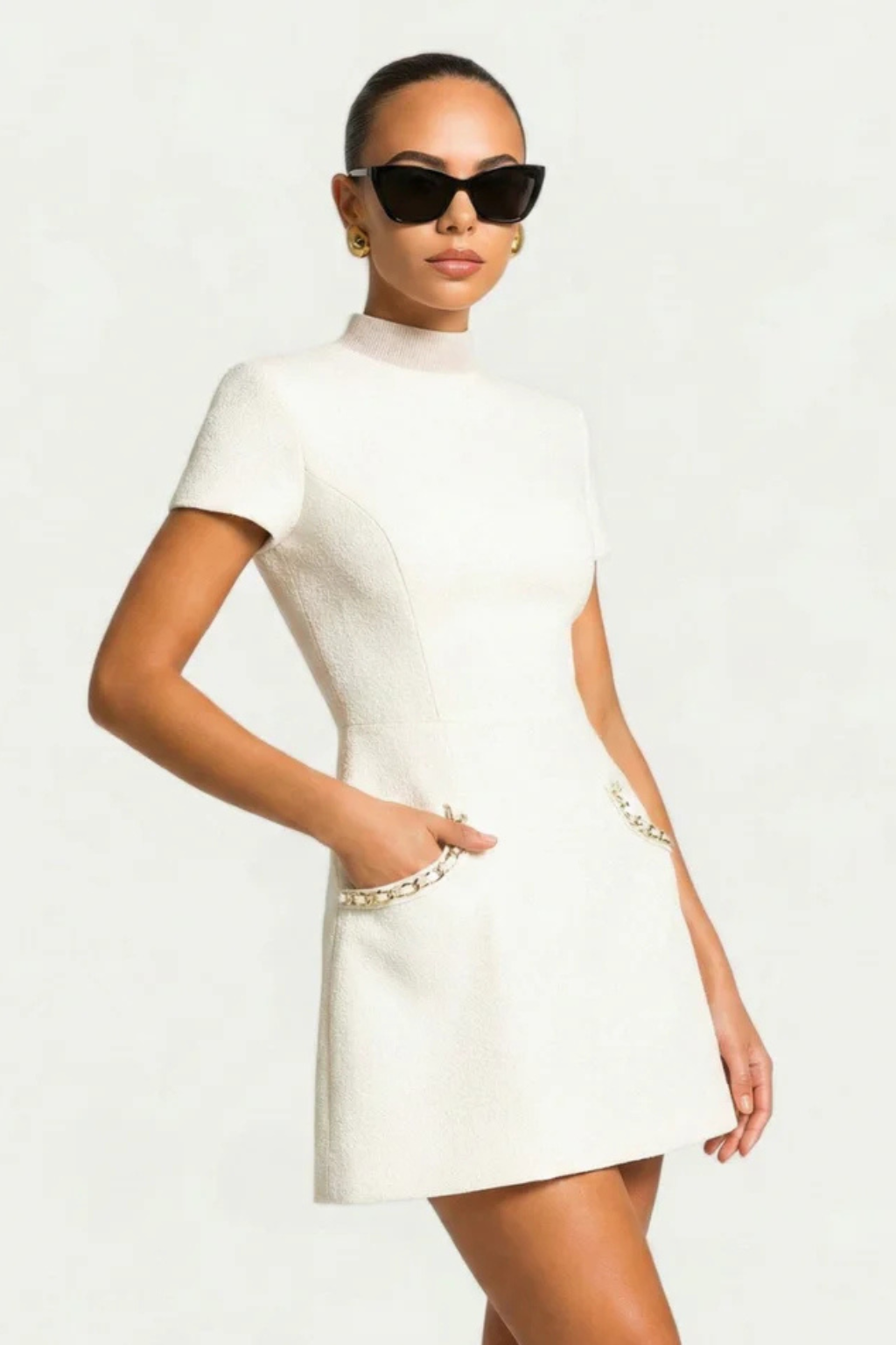 Elegant Bella Women’s Dress featuring stylish pearl-trimmed pockets and short sleeves, perfect for casual outings or special occasions. 4