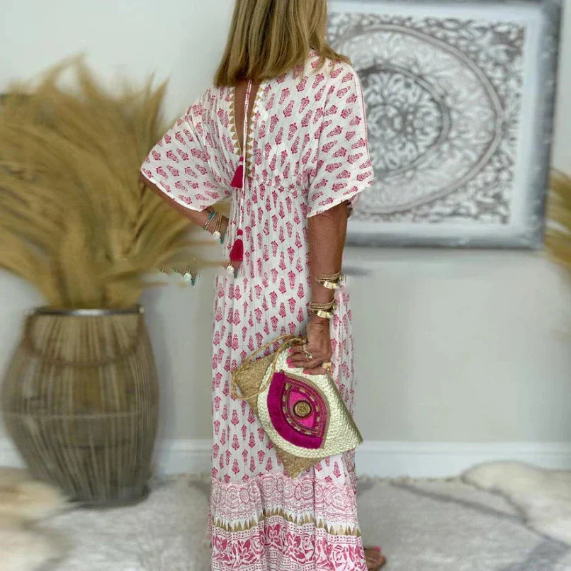 Bella Women's Maxi Dress featuring a vibrant Boho print and elegant V-neck design, perfect for summer outings and casual events. 2