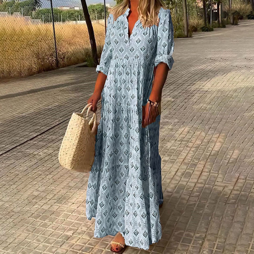 Bella Women’s Maxi Dress featuring a flattering V-neckline and long sleeves, adorned with a stylish Boho print design, perfect for casual outings or special 0