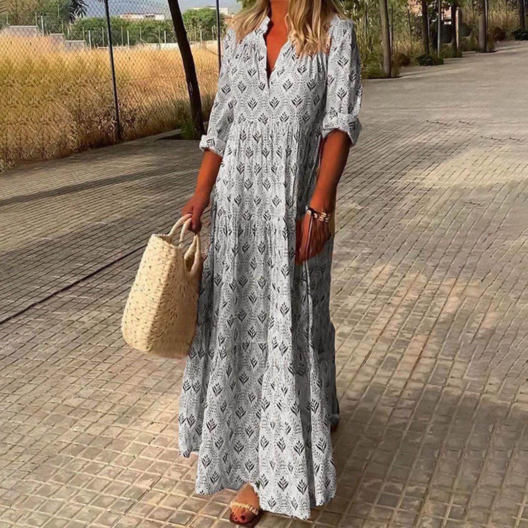Bella Women’s Maxi Dress featuring a flattering V-neckline and long sleeves, adorned with a stylish Boho print design, perfect for casual outings or special 2