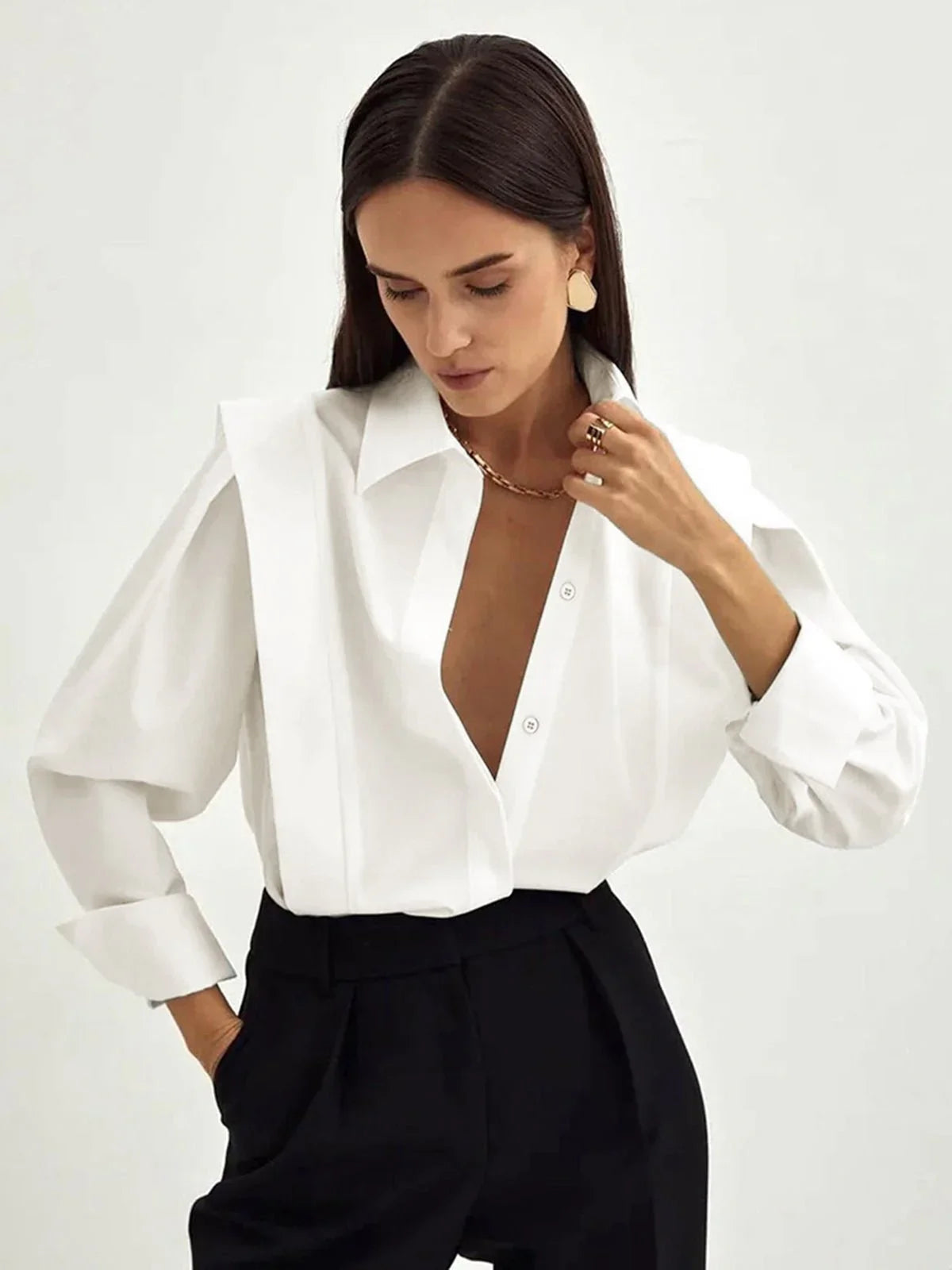 Bella Women's button-down shirt available in multiple colors, featuring a stylish and versatile design perfect for any occasion. 0