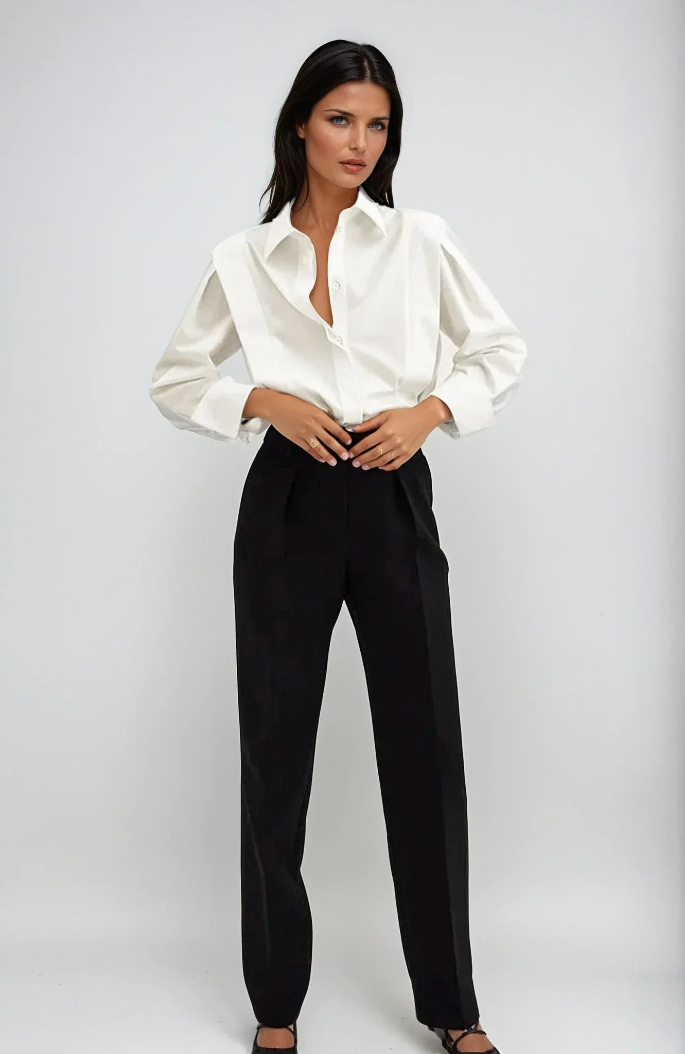 Bella Women's button-down shirt available in multiple colors, featuring a stylish and versatile design perfect for any occasion. 1