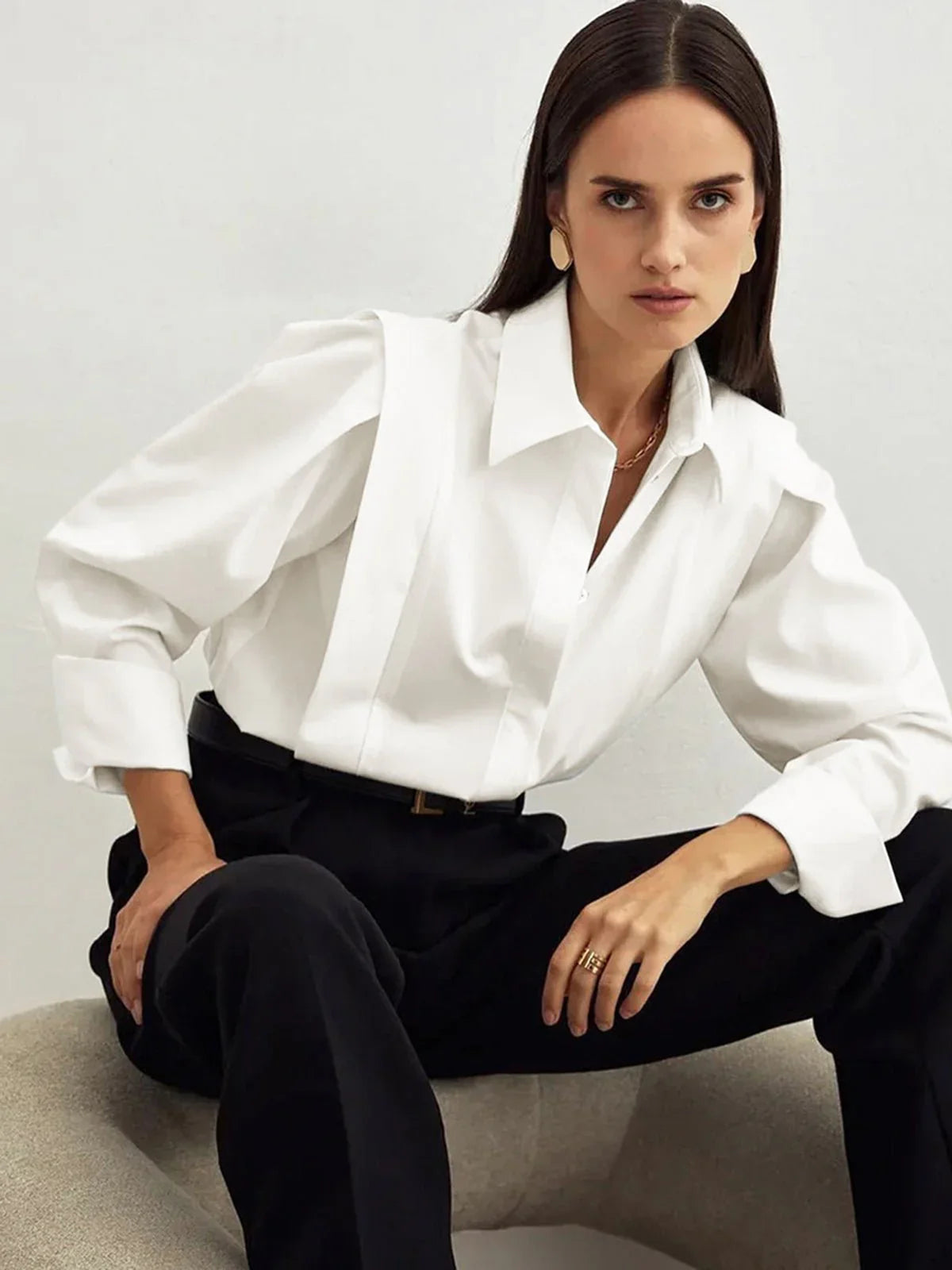 Bella Women's button-down shirt available in multiple colors, featuring a stylish and versatile design perfect for any occasion. 3