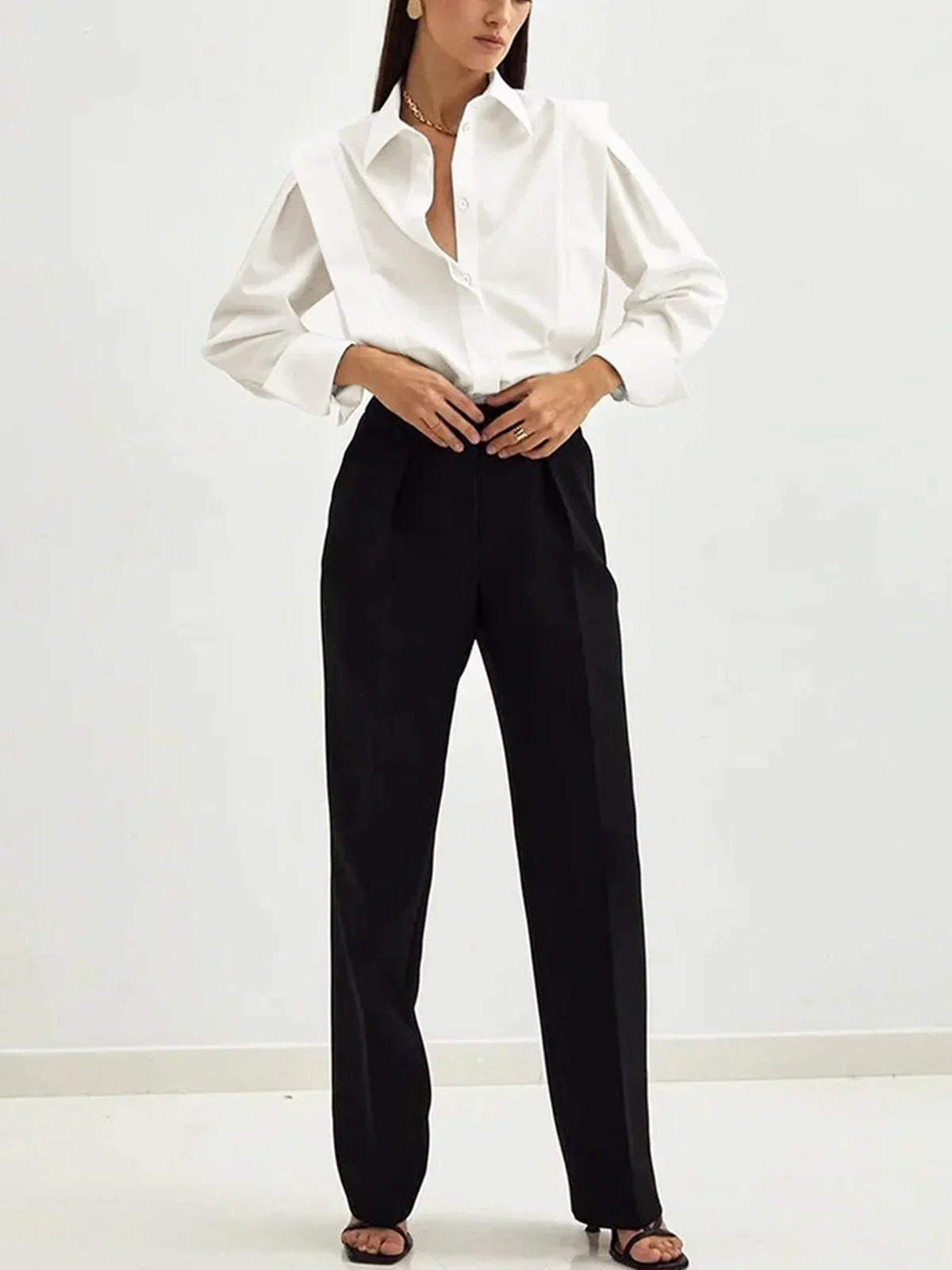 Bella Women's button-down shirt available in multiple colors, featuring a stylish and versatile design perfect for any occasion. 4