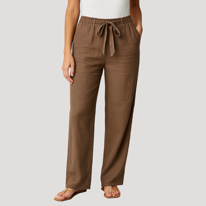 Breezy trousers for women featuring an adjustable drawstring waist, perfect for a comfortable and stylish fit in any casual setting. 1