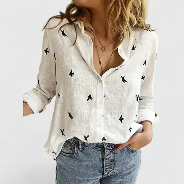 Breezy women’s shirt featuring a soft wavy lapel collar and button-down front, perfect for casual or semi-formal occasions. 8