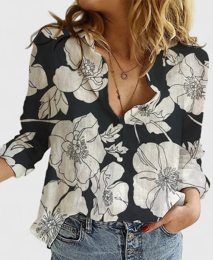 Breezy women’s shirt featuring a soft wavy lapel collar and button-down front, perfect for casual or semi-formal occasions. 9