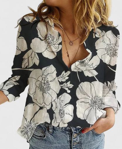 Breezy women’s shirt featuring a soft wavy lapel collar and button-down front, perfect for casual or semi-formal occasions. 9