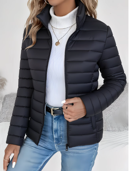 Catriona Women's Quilted Jacket featuring lightweight insulation and a tailored fit, perfect for stylish warmth in transitional weather. 1