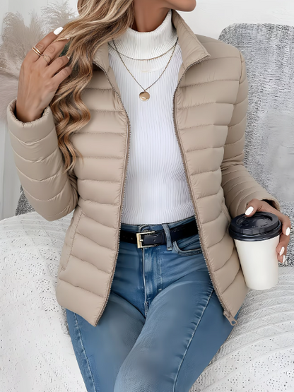 Catriona Women's Quilted Jacket featuring lightweight insulation and a tailored fit, perfect for stylish warmth in transitional weather. 2