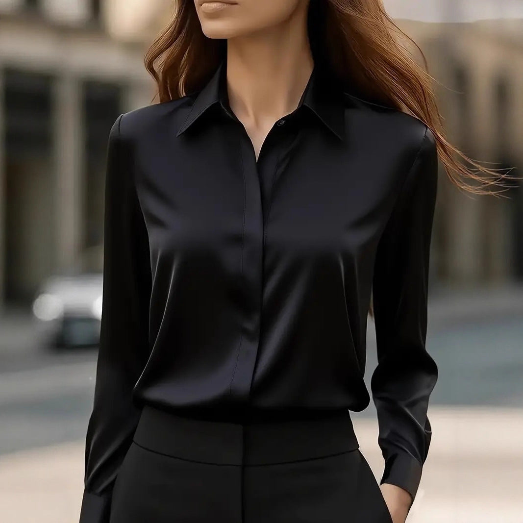 Chic women's blouse featuring a classic collar and elegant button details, perfect for stylish casual or professional outfits. 0