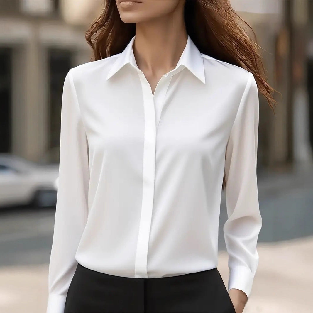Chic women's blouse featuring a classic collar and elegant button details, perfect for stylish casual or professional outfits. 2
