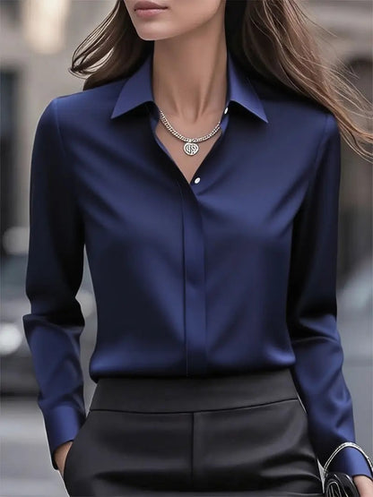 Chic women's blouse featuring a classic collar and elegant button details, perfect for stylish casual or professional outfits. 7